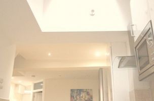 Kitchen leading through to dining table